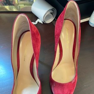 red suede, 4” heels. Slight wear and tear, but still a great looking shoe.